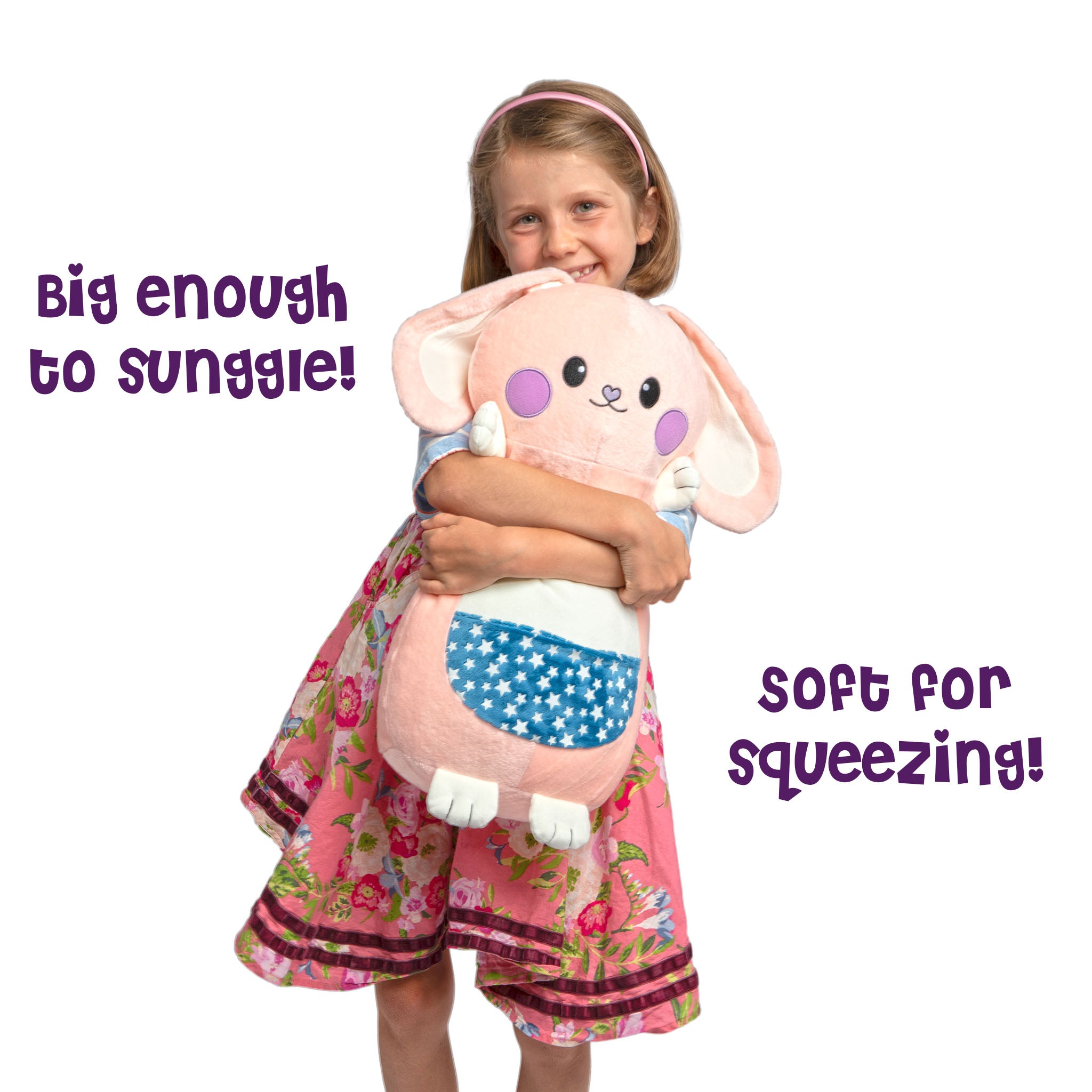 Girl hugging Bella the Bunny GlowMate by Bolderglow