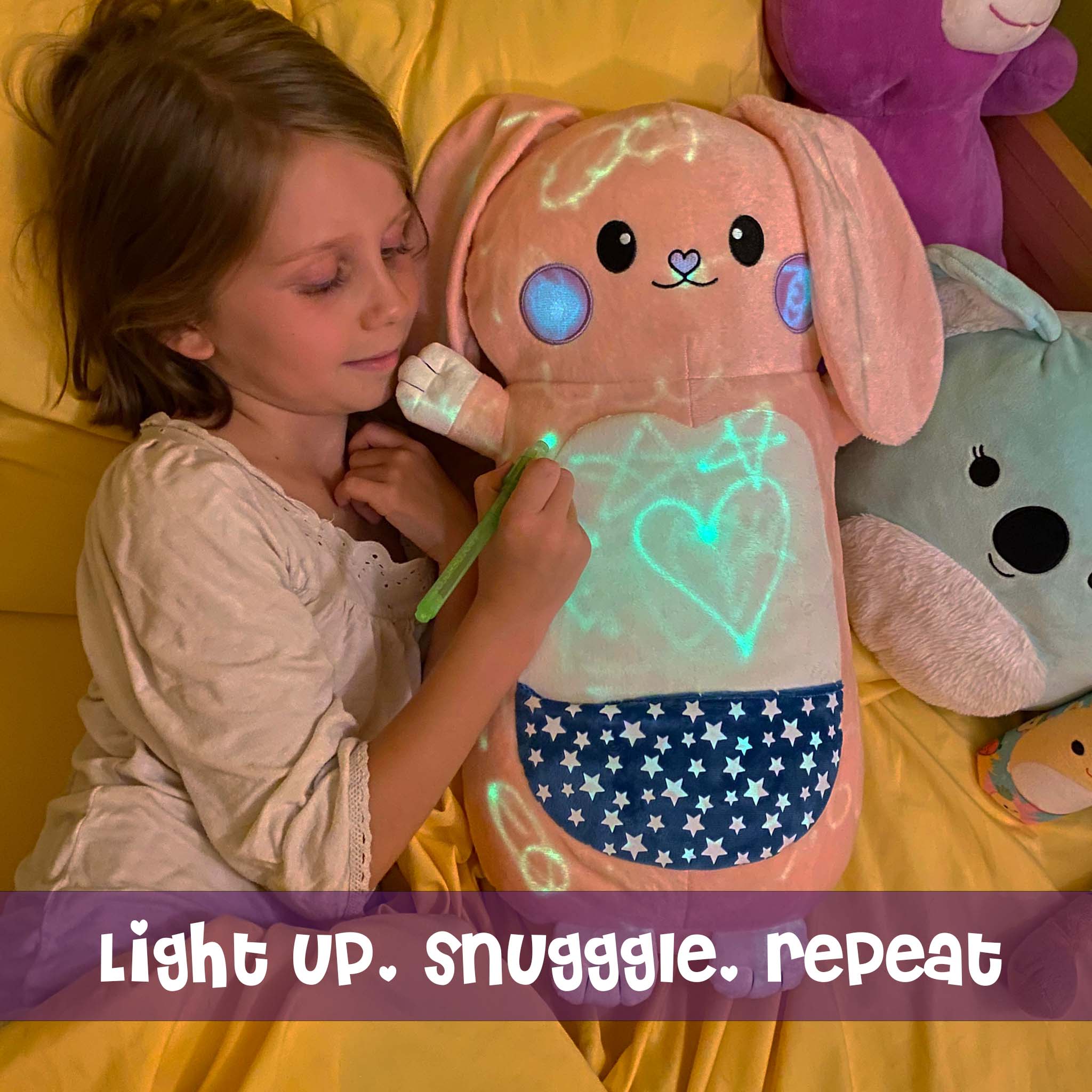 Girl hugging Bella the Bunny GlowMate by Bolderglow
