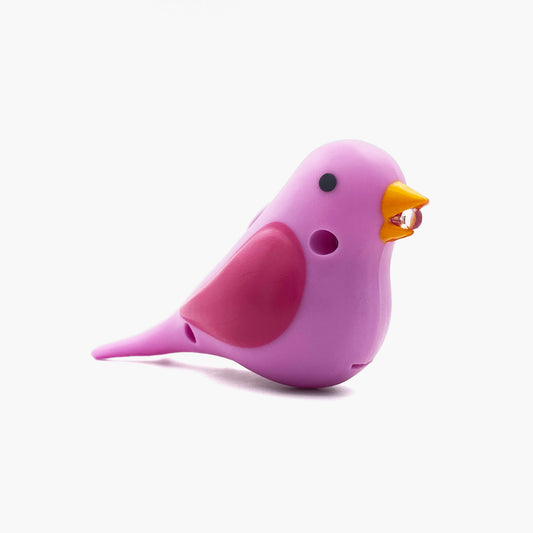 Pink bird shaped pen light with a purple LED facing right at an angle