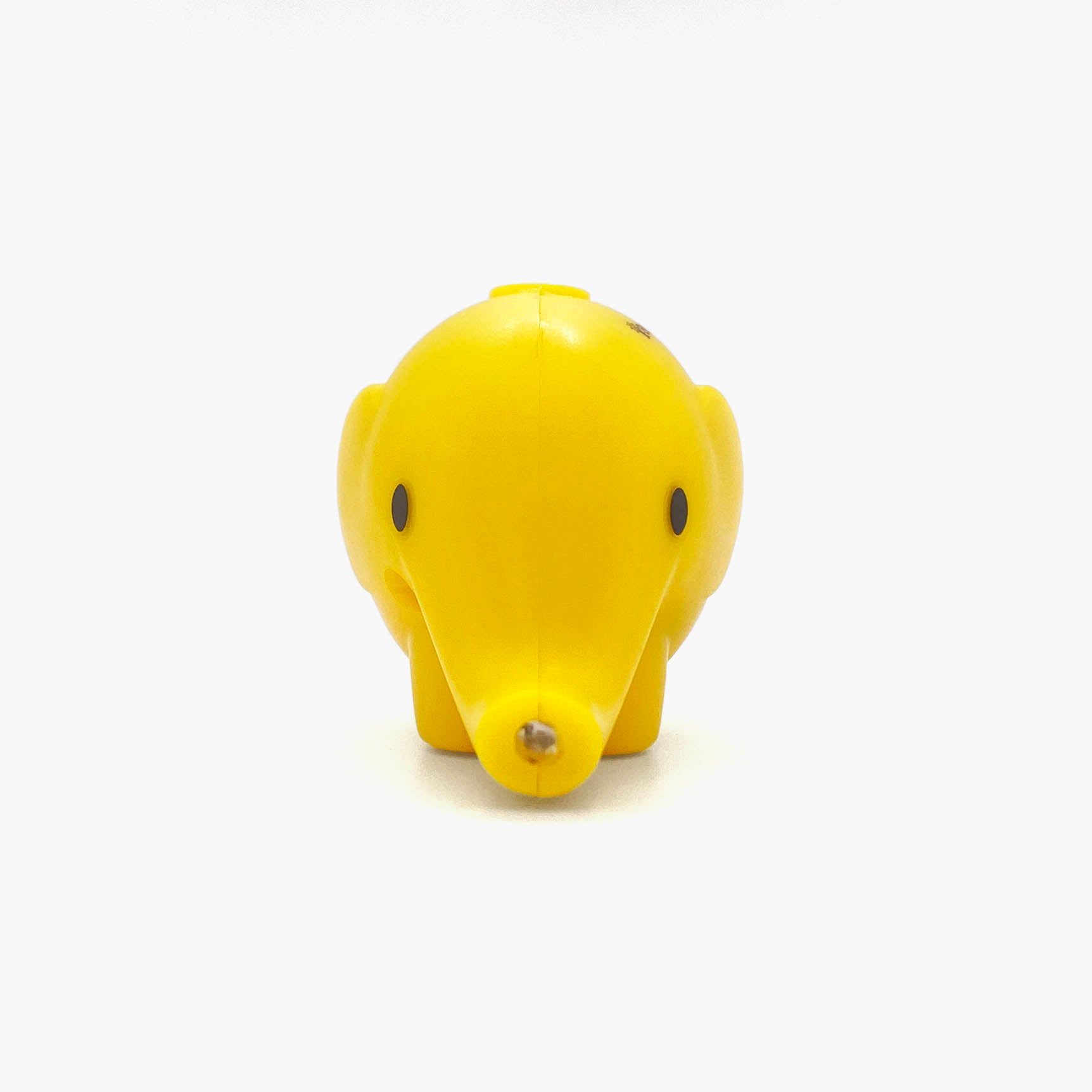 Yellow elephant shaped pen light with a purple LED facing forward