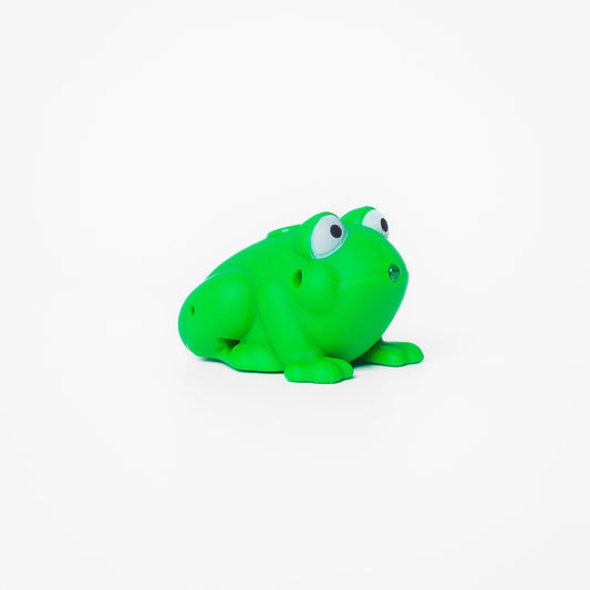 Green frog shaped pen light with a purple LED facing right at an angle