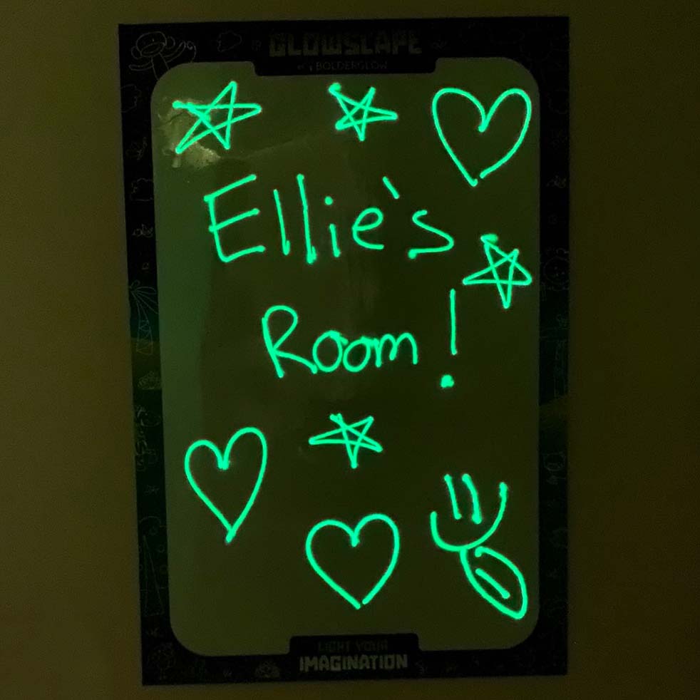 Glowscape in the dark with the words Ellie's Room written