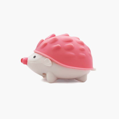 Pink hedgehog shaped pen light with a purple LED facing left