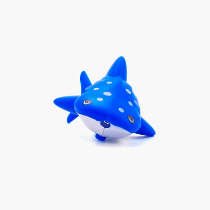 Blue whale shark shaped pen light with a purple LED facing forward