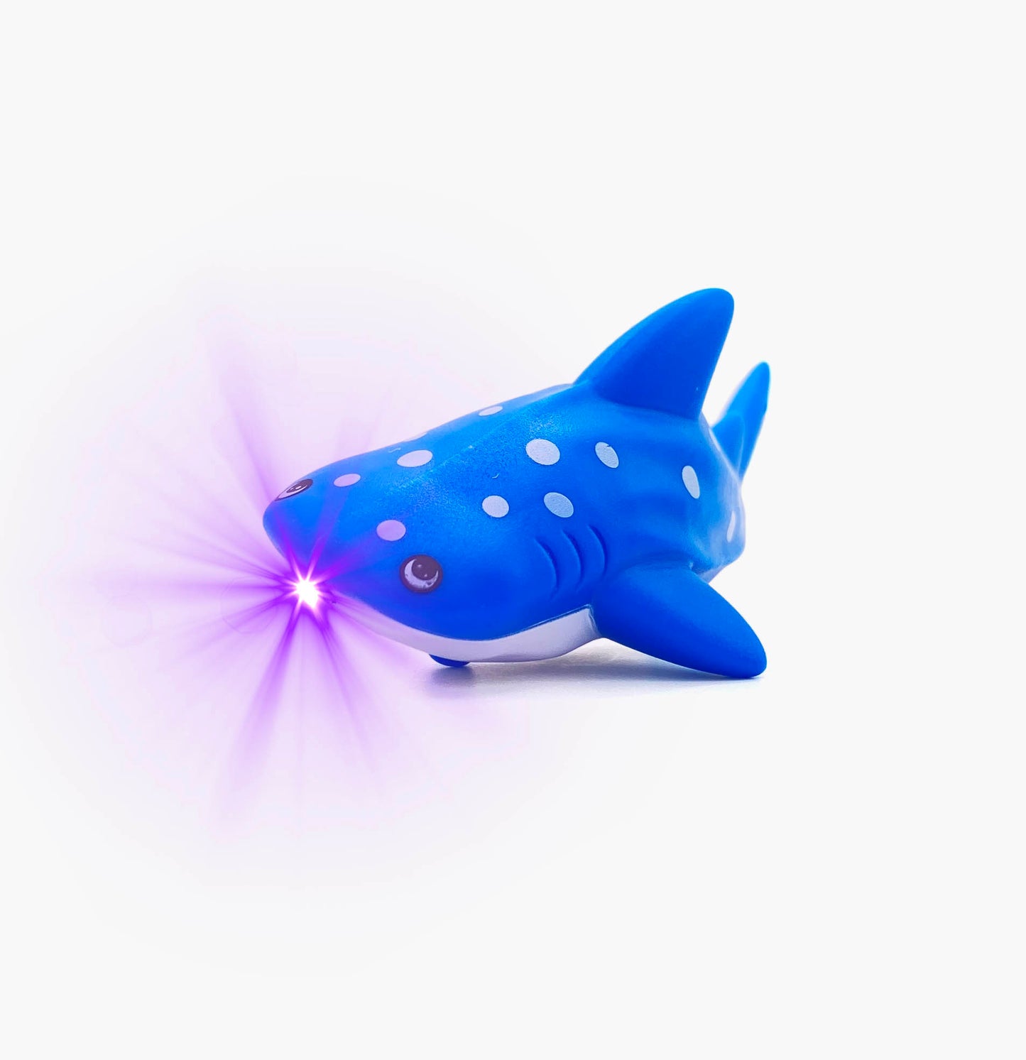 Blue whale shark shaped pen light with a purple LED facing left at an angle with purple lens flare