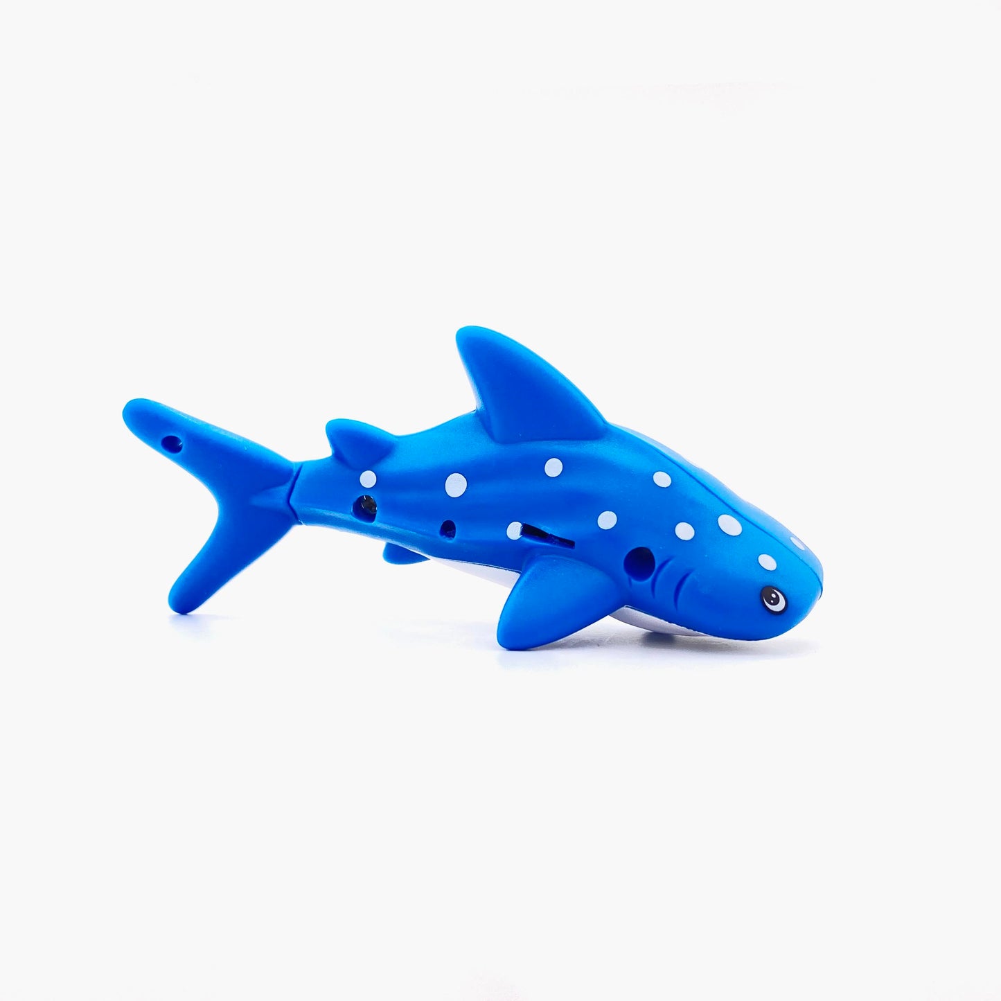 Blue whale shark shaped pen light with a purple LED facing right 