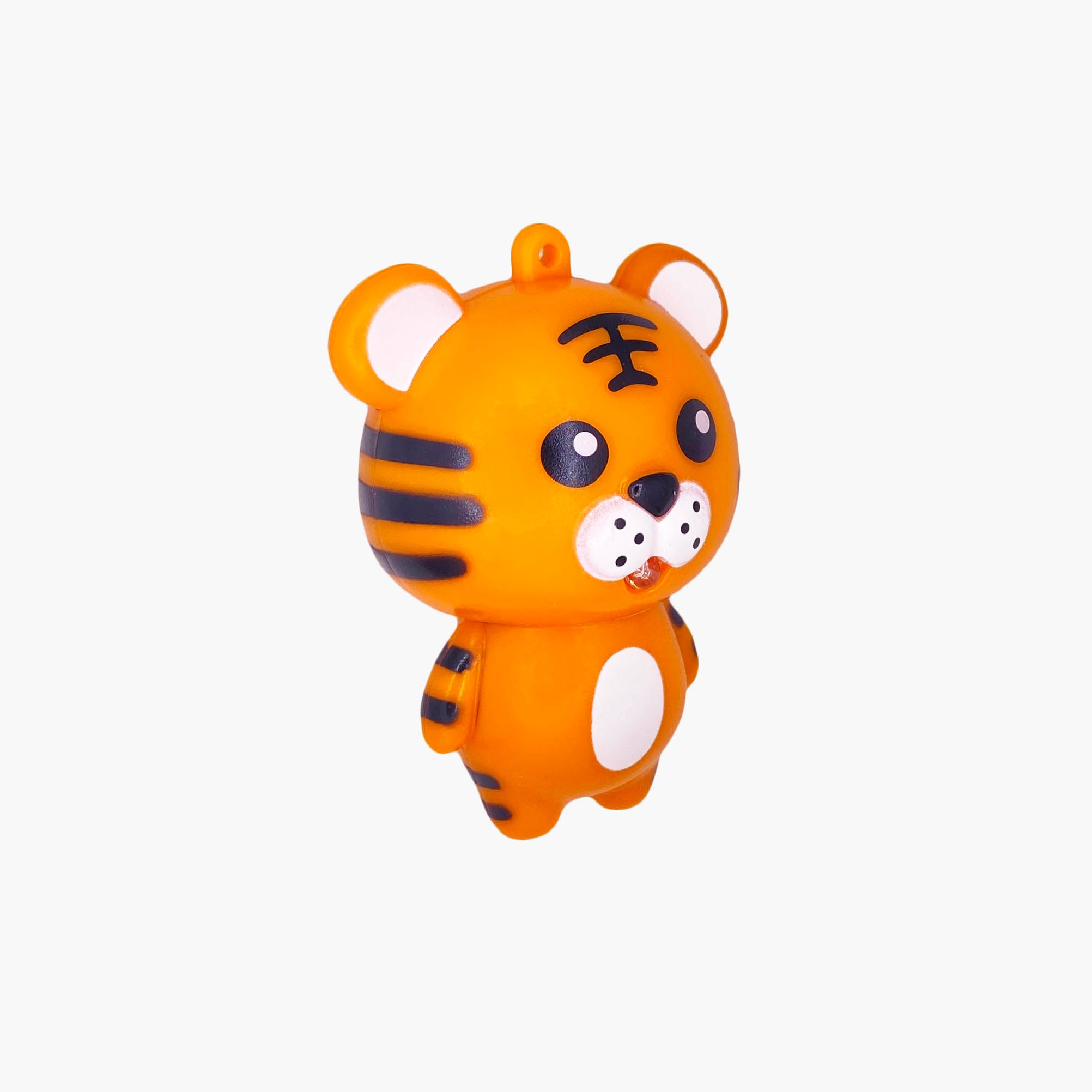 Orange tiger shaped pen light with a purple LED facing right at an angle